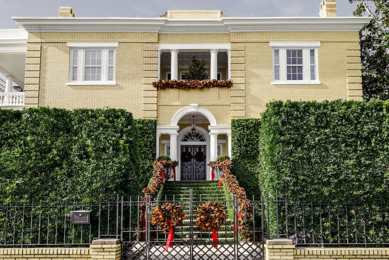 Charleston's historic downtown featuring colorful row houses and palm trees