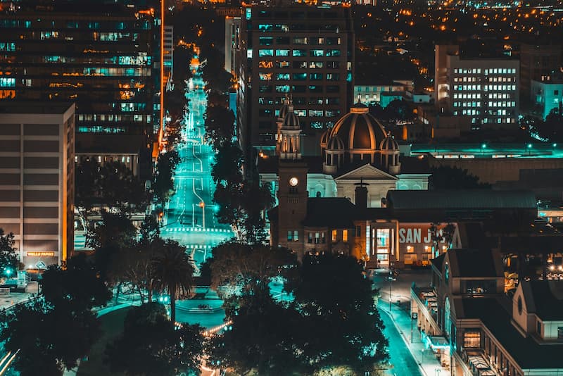 San Jose skyline featuring tech campuses and surrounding mountains